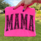 Distressed Mama BLACK DTF Heat Transfer, pink fabric with 'MAMA' text design.