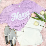 Mama Fluffy Patch, pink sweatshirt with fluffy white text, white pants, striped slip-on shoes, and tulips on a pink fuzzy background.