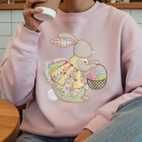 Faux Embroidery Patchwork Bunny with Basket DTF Heat Transfer, on a pink sweatshirt featuring a bunny holding a basket of Easter eggs