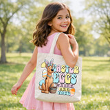 Easter Eggs Where Are You? DTF Heat Transfer, colorful Easter-themed design of a cute dog with bunny ears and eggs on tote bag.