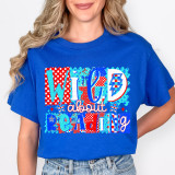 Wild About Reading DTF Heat Transfer, colorful and playful graphic design on a blue t-shirt featuring reading-themed elements.