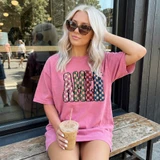 Faux Chenille Checkered Amen DTF Heat Transfer, a pink t-shirt with colorful checkered faux chenille pattern.