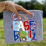 Patriotic Baseball Oversized Bow DTF Heat Transfer, colorful patriotic baseball-themed design on grey fabric with bow and sports elements.