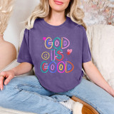 God Is Good Crayon DTF Heat Transfer, colorful hand-drawn style design on a purple T-shirt.