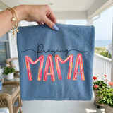Praying Mama DTF Heat Transfer, colorful pink and yellow lettering on a blue fabric, showcasing a DIY heat transfer product for clothing or accessories.