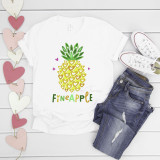 Fineapple Pineapple heart print Sublimation Transfer, colorful pineapple design with heart shapes and the word 'FINEAPPLE' on a white T-shirt, paired with denim jeans and sneakers.
