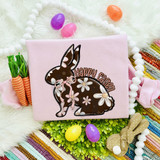 Happy Easter DTF Heat Transfer, decorative Easter bunny with floral design and 'Happy Easter' text on pink fabric.