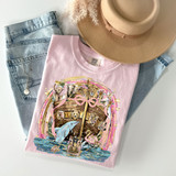 Noah's Ark DTF Heat Transfer, colorful illustration of animals on the ark with a dolphin, lion, giraffe, zebra, and other animals on a pink t-shirt.