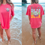 Beach Bum Stacked SET DTF Heat Transfer, pink oversized T-shirt with graphic design of a skeleton hand making a rock sign and colorful text on the back.