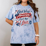 God Bless America DTF Heat Transfer, patriotic graphic design on a light blue tie-dye t-shirt.
