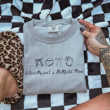 Literally Just A Ballfield Mom DTF Heat Transfer, gray sweatshirt with playful ballpark-themed icons and text.