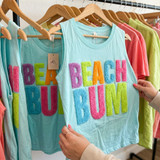 Beach Bum Fluffy Patch, sleeveless tank top with colorful fluffy patch letters spelling 'BEACH BUM' in bright pastel colors.