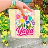 Flower Bouquet Title DTF Heat Transfer, colorful floral design with various flowers and the name Yaya written in bold pink font.