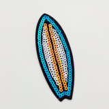 Surfboard Sequin HAT/POCKET Patch, colorful sequin patch in the shape of a surfboard with blue, white, and orange sequins on black fabric