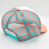 Peach, Mint, & White Checkered Foam Trucker Hat, a colorful mesh baseball cap with a checkered pattern in peach, mint green, and white, featuring a curved peach brim and adjustable blue strap.