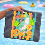 Tocan Do It DTF Heat Transfer, vibrant tropical toucan bird design on a gray fabric shirt with colorful leaves and flowers, suitable for custom clothing printing.