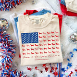 Paws & Stripes Forever DTF Heat Transfer T-shirt with American flag design featuring paw prints and dachshund silhouettes in red and pink, patriotic patriotic-themed pattern.