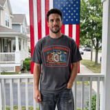 Reel American DTF Heat Transfer, on a person's black t-shirt.