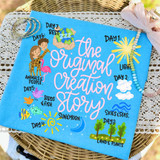 The Original Creation Story, colorful illustration of the days of creation with animals, sun, moon, stars, trees, clouds, and seas on a blue background for a heat transfer product.