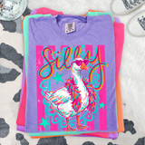 Silly Goose DTF Heat Transfer, colorful design of a stylized goose wearing pink sunglasses on a purple T-shirt.