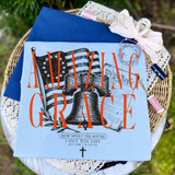 Amazing Grace Patriotic DTF Heat Transfer, displayed on fabric with American flag and bell design, suitable for patriotic apparel and crafts.