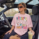 Slingin' Pills To Pay The Bills DTF Heat Transfer, young woman sitting in car holding iced drink, wearing pink T-shirt with medicine themed graphic design.