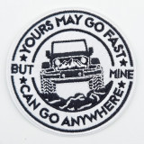 Yours May Go Fast, But I Can Go Anywhere Embroidered Hat Patch, 3-inch round patch with a mountain-climbing truck illustration and motivational slogan in black and white.