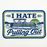 I Hate Pulling Out BLUE Pontoon Hat Patch – 5 inches wide, embroidered patch featuring a pontoon boat, green sunset, and the text 'I Hate Pulling Out' in blue and green threads.