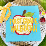 Grade School Hallelujah Apple DTF Heat Transfer, colorful apple design with the text 'First Grade, Hallelujah' on a blue background.