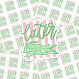 Later Gator Vinyl Sticker Sheet – Waterproof & Weatherproof, featuring green crocodile and pastel pink and white striped background with 'later' written in cursive.
