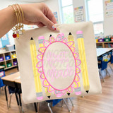 Coquette Grade School DTF Heat Transfer, educational and decorative heat transfer design with pencils and the words 'first grade' on a fabric school bag.