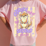 Otterly Ready Grade School DTF Heat Transfer, colorful cartoon otter illustration on pink T-shirt design for children with playful text.