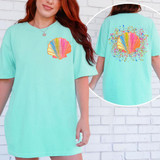 Coastal Shell SET DTF Heat Transfer, colorful shell design on mint green T-shirt, front and back views showing vibrant shell graphic and background splashes.