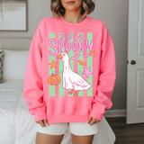 Just A Spooky Goose DTF Heat Transfer, colorful Halloween-themed design featuring a cartoon goose with a pumpkin, stars, bats, and the text 'Just A Spooky' on a pink sweatshirt.