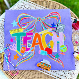 Retro Teach Rainbow Bow DTF Heat Transfer, colorful rainbow bow and educational school-themed design on purple fabric.