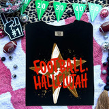 Football Hallelujah DTF Heat Transfer, black T-shirt with football-themed graphic and bold red text, surrounded by football decorations and party banners.
