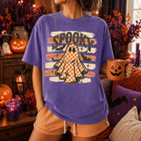 Spooky Checkered Ghost DTF Heat Transfer, Halloween themed ghost design on purple T-shirt with orange and black checkered ghost and bat illustrations for festive decoration.
