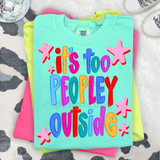 It's Too Peopley Outside DTF Heat Transfer, colorful graphic design on a mint green t-shirt with star illustrations.