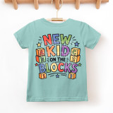 New Kid On The Blocks DTF Heat Transfer, colorful children's t-shirt with playful block and star design.