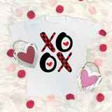 Plaid XOXO INFANT/TODDLER Screen Print Heat Transfer T-shirt with X and O heart design, featuring red and black plaid pattern and small red hearts, surrounded by pink and red petals and decorative heart ornaments.