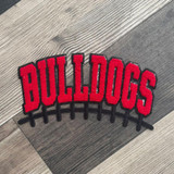 Bulldogs Red & Black Chenille Football Patch, embroidered sports patch with the word 'BULLDOGS' in bold red letters outlined in black, featuring a football lacing design at the bottom.