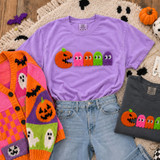 Soft fluffy Halloween appliqué patch featuring a smiling pumpkin and colorful ghost characters in orange, pink, green, and purple with a plush textured finish.