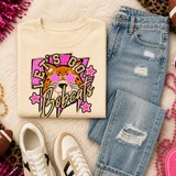 Pink Glitter Mascot - 62 teams - DTF Heat Transfer, a product image showing a cream-colored sweatshirt with a colorful bobcat mascot graphic, paired with distressed jeans, sneakers, and accessories, suitable for team or school spirit apparel.