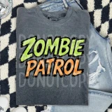 Zombie Patrol DTF Heat Transfer, graphic design of a zombie patrol slogan on a gray t-shirt.