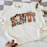 Howdy Ghost DTF Heat Transfer, Halloween-themed graphic T-shirt with a ghost wearing a hat and holding a pumpkin, featuring spooky and autumn illustrations.