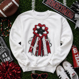Homecoming Mum Sequins Patch - Red, product image showing a white sweatshirt with a colorful sequin homecoming mum patch design, surrounded by football-themed and celebration accessories.