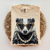 Glam Badger DTF Transfer, graphic illustration of a stylish dog wearing leopard print glasses and a pearl necklace.
