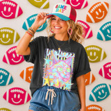 Neon Star Mascot DTF Transfers | School Spirit Mascot Collection, colorful neon star-themed mascot design on a girl wearing a black t-shirt and a cap, with football-themed wall decor in the background.