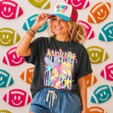 Neon Star Mascot DTF Transfers | School Spirit Mascot Collection, featuring a vibrant, colorful neon star mascot design on a sporty shirt with a cheerful girl wearing a game day hat.