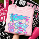 Blue Mascot DTF Transfers | School Spirit Mascot Collection, featuring a colorful, vibrant mascot design on a pink T-shirt, with cheerleading-related decorations and accessories around it.
